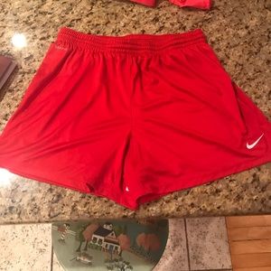 Nike red soccer shorts
